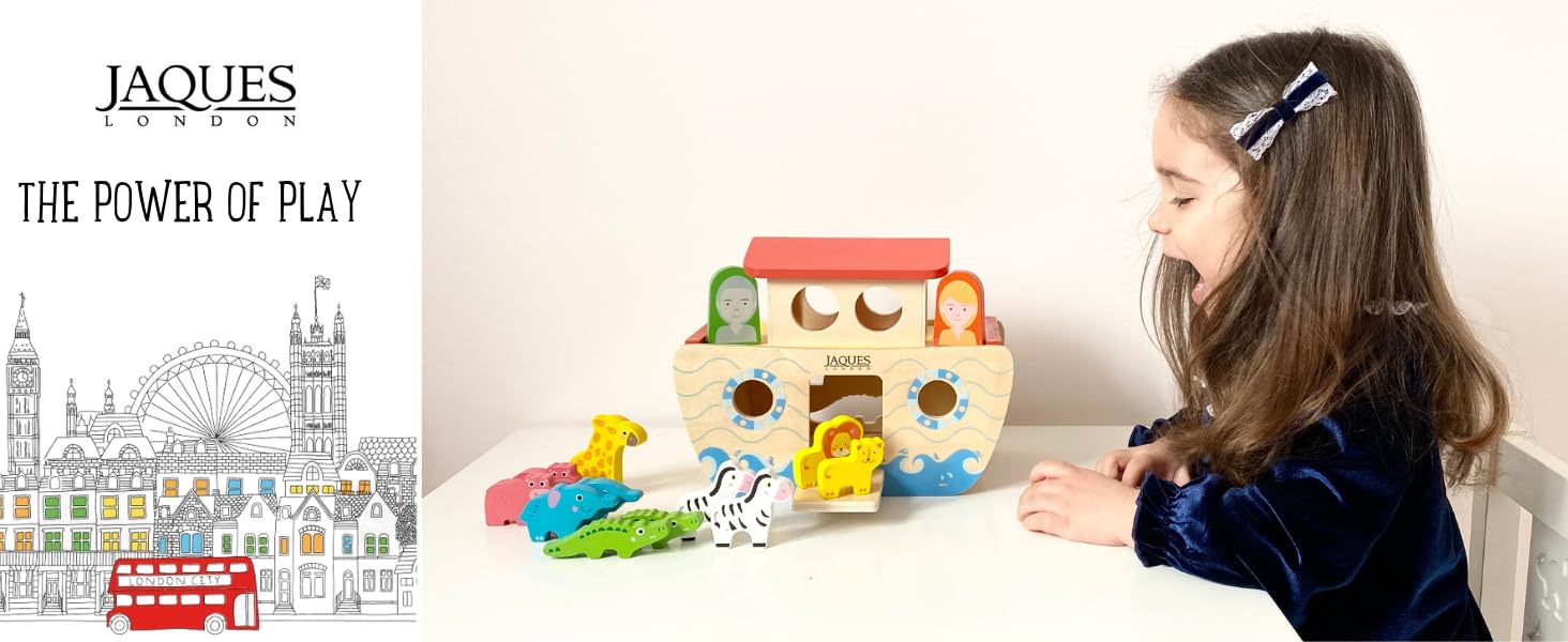 Child playing with wooden toys 