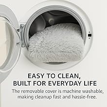 Removable plush dog bed cover being washed in front-loading washing machine.